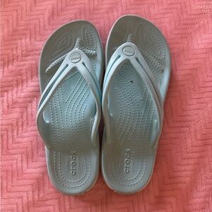 Light blue turquoise croc flip flops